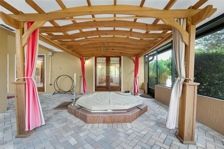 Hot Tub in screen in patio area