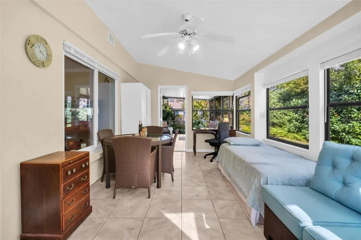 Private rear green views and access to screened lanai~