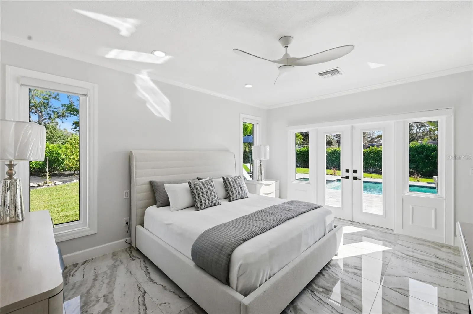 Primary Bedroom overlooking Pool/Spa