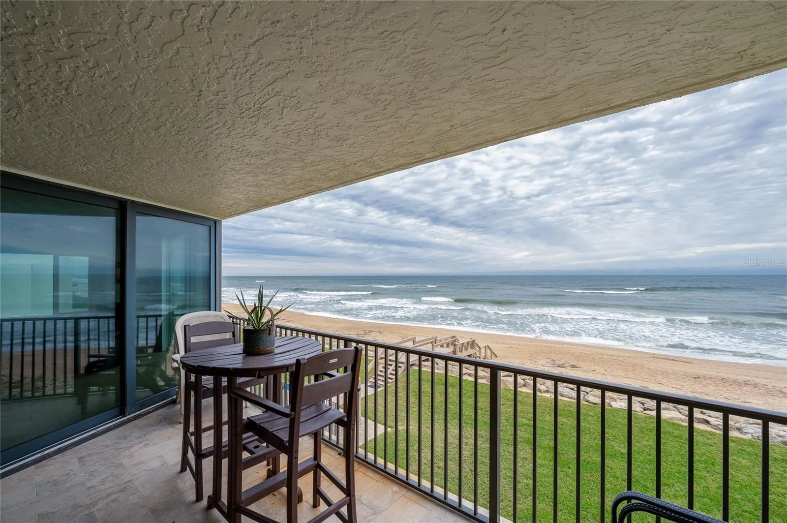 A prime vantage point overlooking the beach and dunes, perfect for sunrise watching or enjoying coastal breezes.
