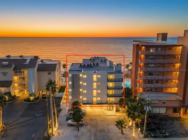 Aerial View Front of Building with Water