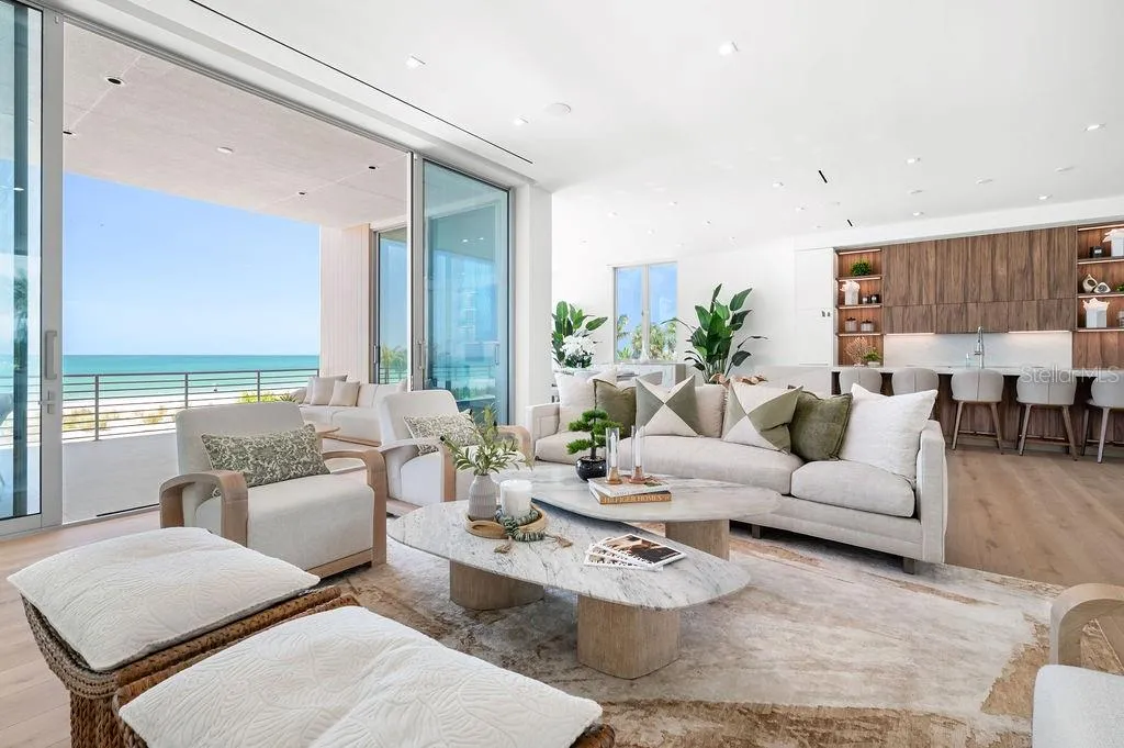 Open living space includes a vapor fire place to designate additional club room