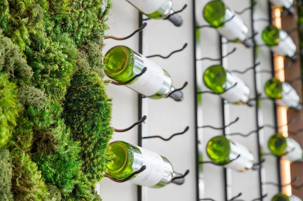 Biophyllic greenwall and wine display, complete with Thermador™ wine tower