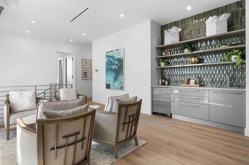 Second floor hosts a morning/evening bar and seating for a cozy conversation