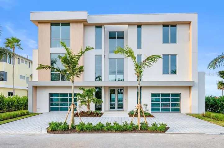 Welcome to 6489 Gulfside road on Longboat Key. Recently completed and ready for move in! Designed by DSDG Architects, built by Seaward Homes