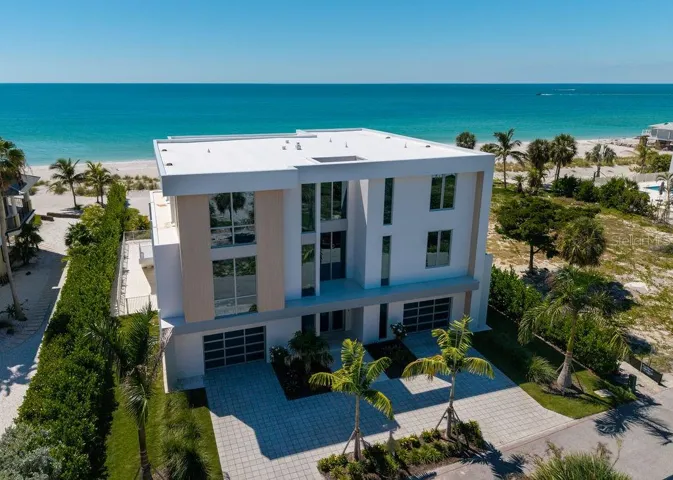 Welcome to 6489 Gulfside road on Longboat Key. Recently completed and ready for move in! Designed by DSDG Architects, built by Seaward Homes