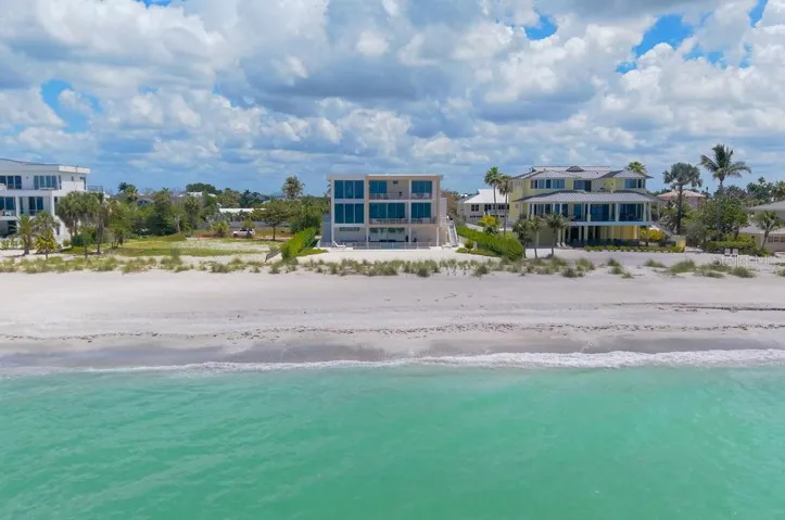 Welcome to 6489 Gulfside road on Longboat Key. Recently completed and ready for move in! Designed by DSDG Architects, built by Seaward Homes