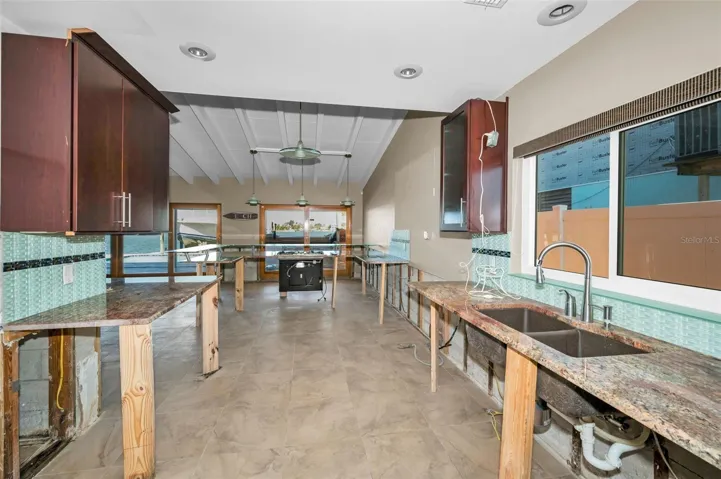 Huge Galley style Kitchen with plenty of cabinet and counter space
