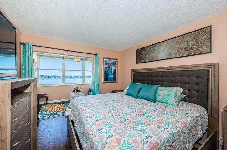 Primary bedroom with water front views