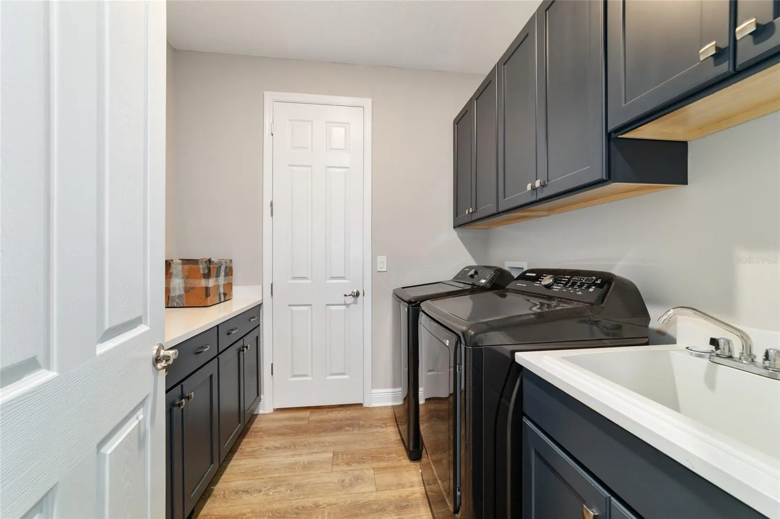 Extra cabinets in Laundry and utility sink