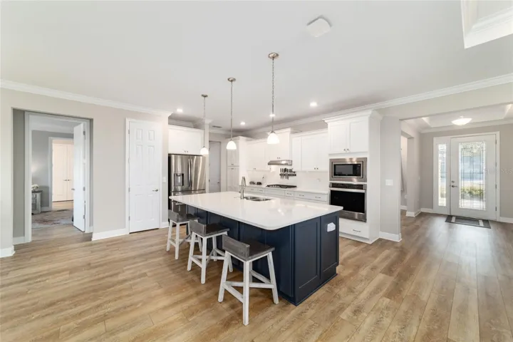 Two-tone kitchen cabinetry in slate and white