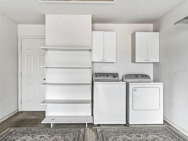 Outside Washer , Dryer and Shelves