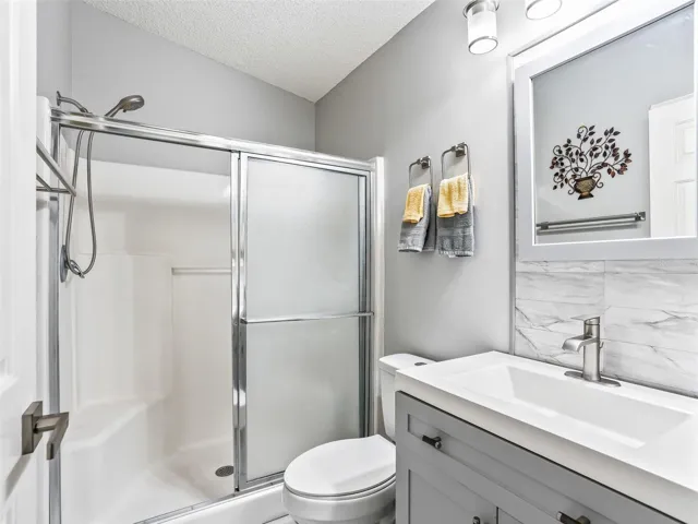 Primary Bathroom with Walk-In Shower and Tall Upgraded Vanity