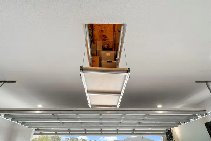 Electronic attic lift. A rare upgrade that makes attic storage actually usable