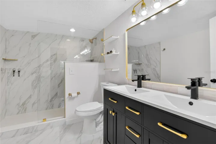 MASTER BATH WITH SHOWER GLASS