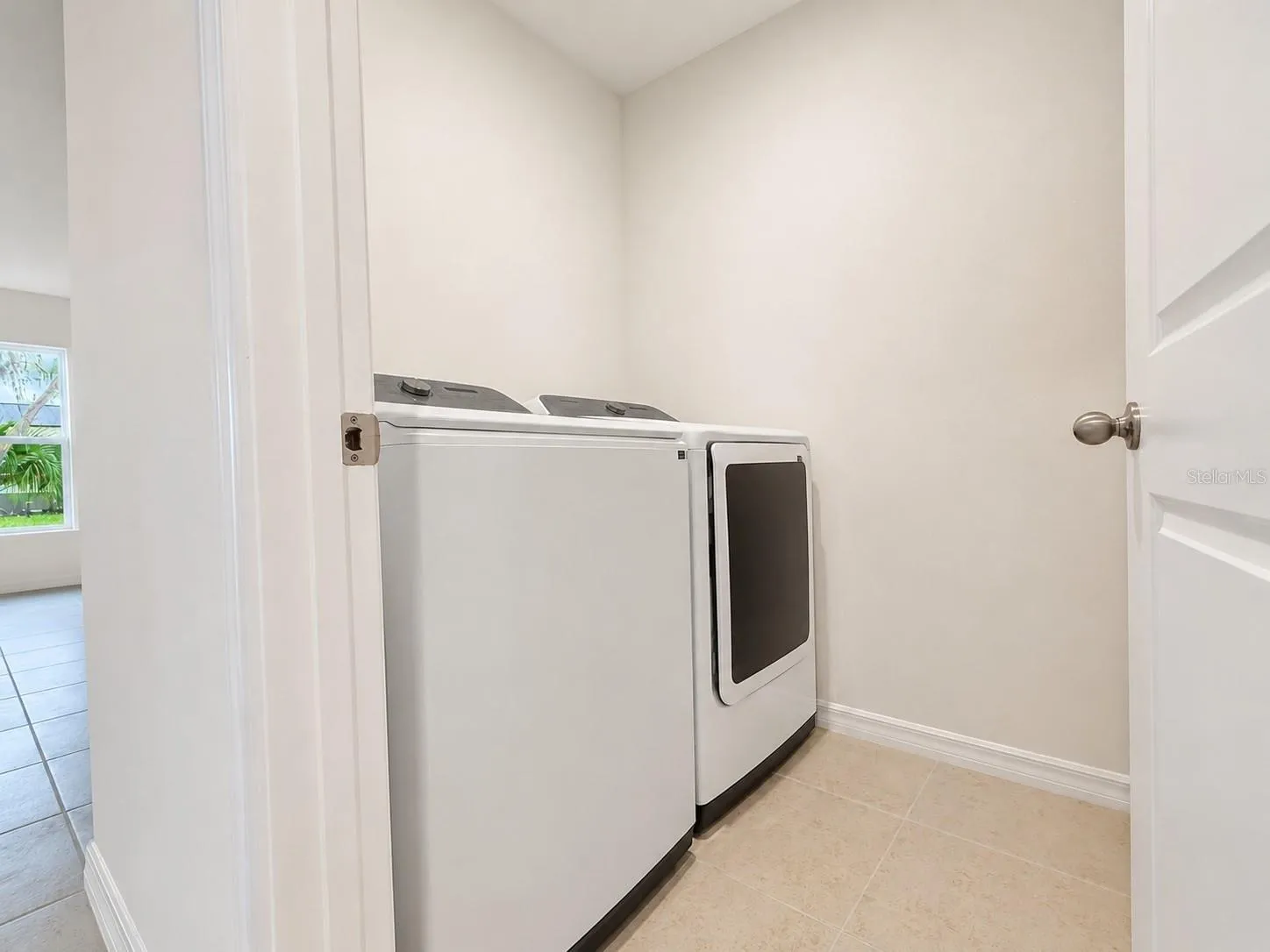 Laundry Room with Washer &amp; Dryer Already Installed