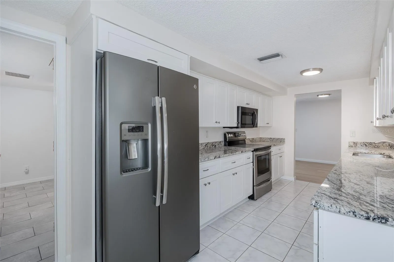 Galley Kitchen with Granite