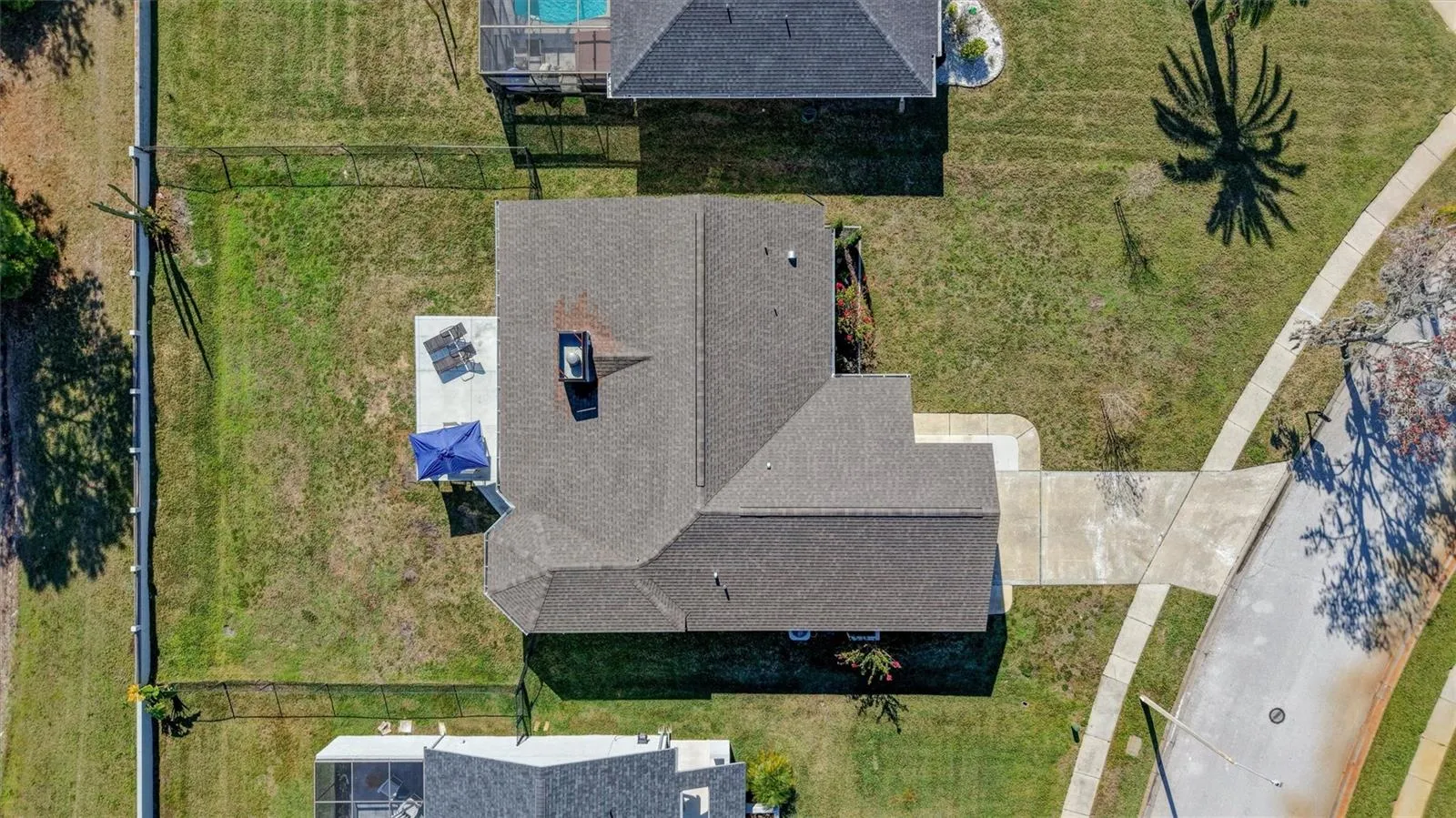 Aerial view showing the large fenced back yard