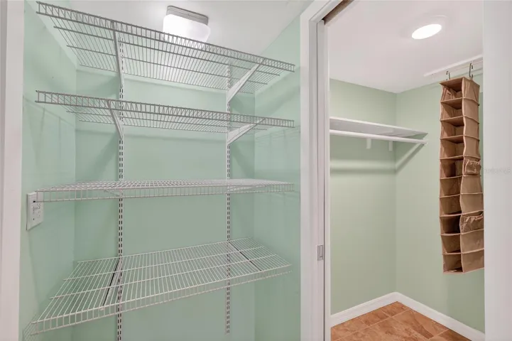 PRIMARY WALK IN CLOSET/ STORAGE
