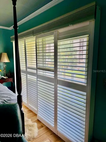 Shutters inside sliding doors and screen for 3rd floor balcony