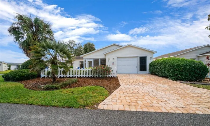 Front Palm Tree Completes the Florida Landscaping