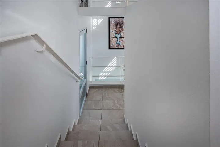 Stairs to third level unit