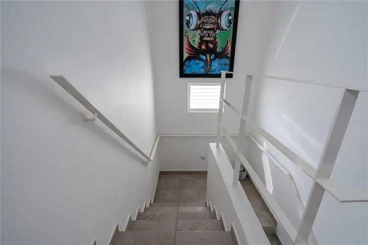 Stairs to third level unit