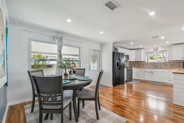 DINING AREA WITH VIEW OF KITCHEN