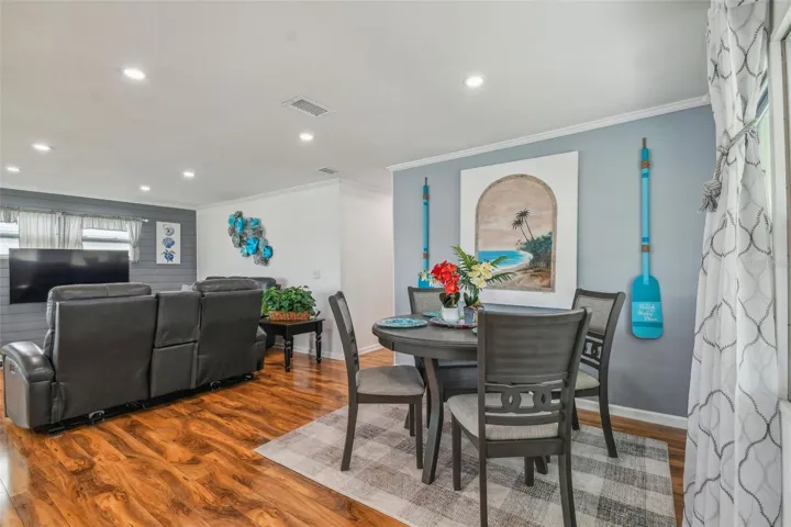 DINING AREA WITH VIEW OF LIVING AREA