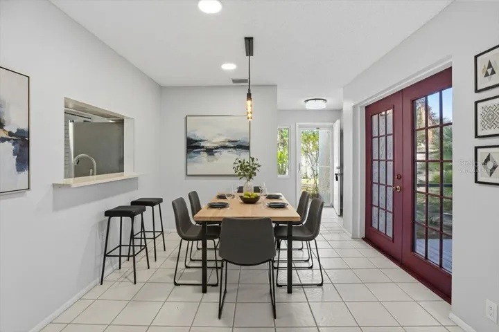 Virtually staged photo.  Dining Room.