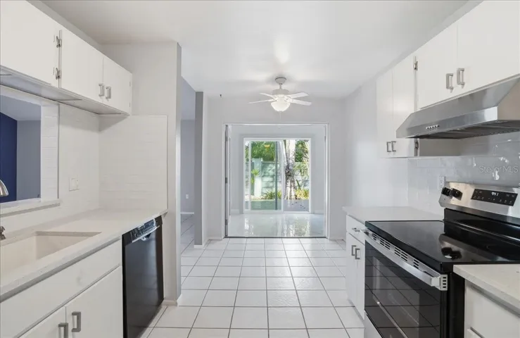 Kitchen through to Sun Room.