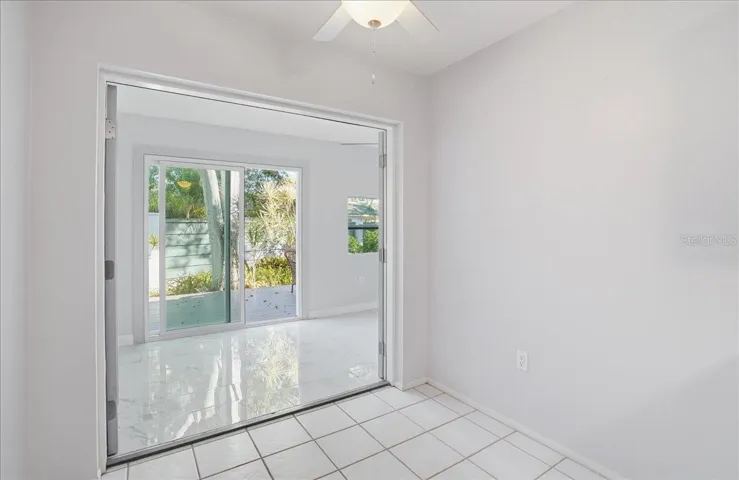 Kitchen Eat-in through to Sun Room.