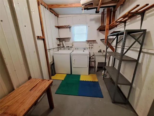 Washer/Dryer area with storage