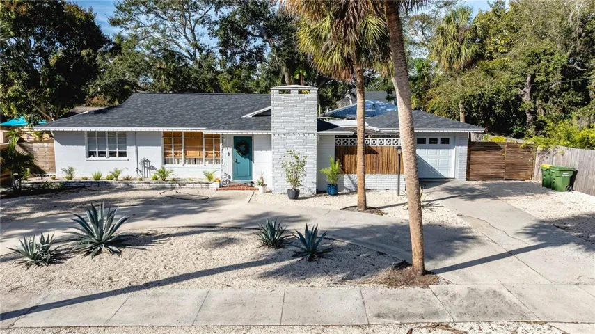 Charming 1-level home with 1-car garage, new roof, and semi-circle driveway