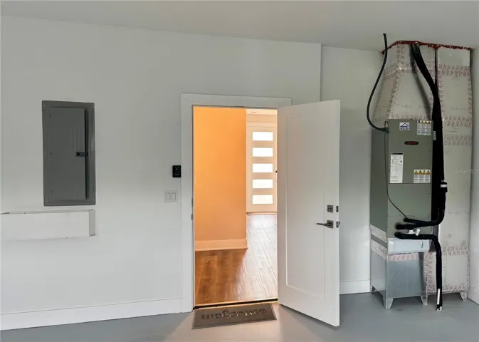 Trane HVAC, Gas on-demand water heater Sprinkler System equipment room in garage