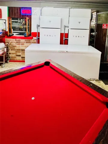 Pool Table and Tesla batteries for restaurant