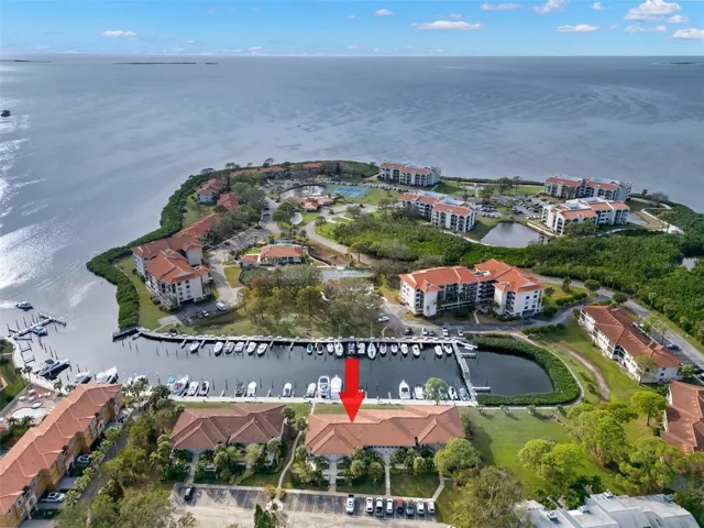 Welcome to 1802 Mariner Dr #21! Corner unit with panoramic water views!