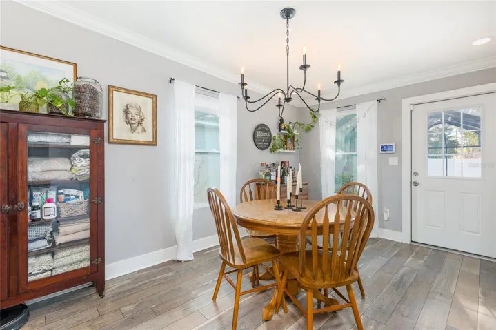 Dining room opens to backyard life