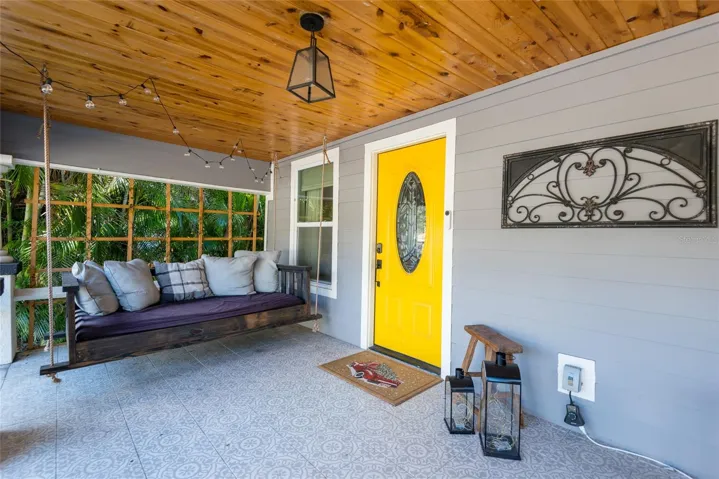 Large, custom swing makes for peaceful rest on the porch
