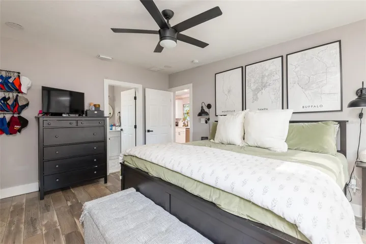Primary bedroom has sliding doors to back deck