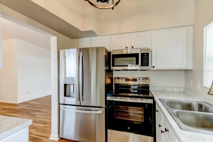 Kitchen leading into living area.