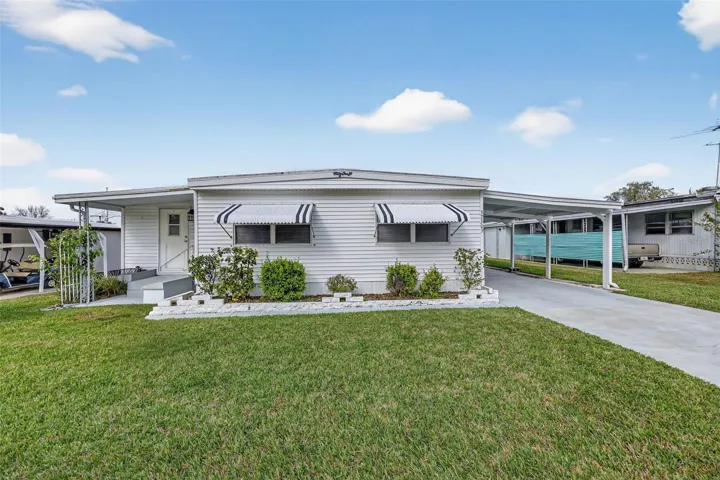 Triple Wide w/ Carport
