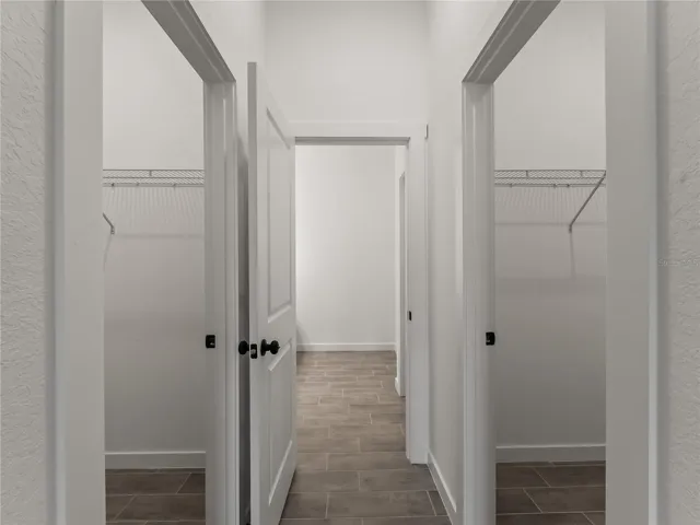 Primary Bedroom Hallway into Bathroom