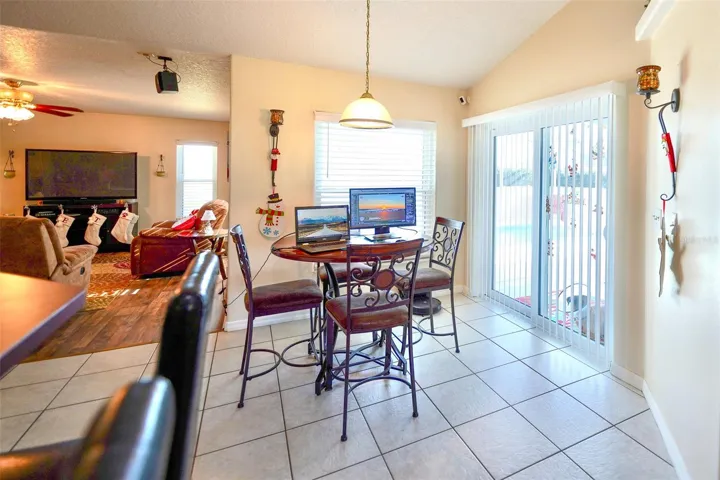 Dinette area with sliders to pool area