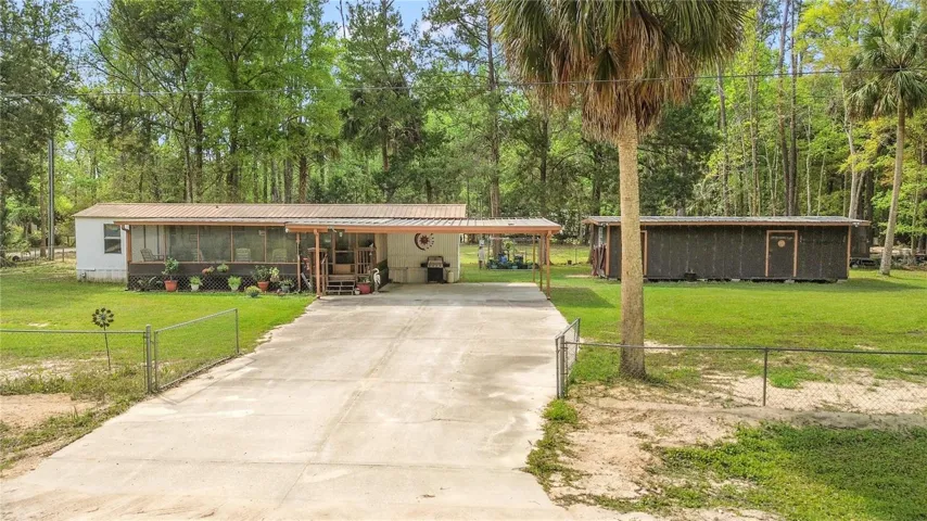 home and workshop on .58 acres