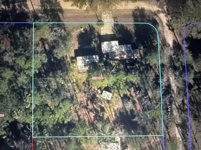 aerial includes full 1.16 acres- property for sale is .58 acres with right of refusal for additional .58 acres behind home.