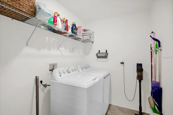 Dedicated laundry room with convenient space for washer, dryer, and storage