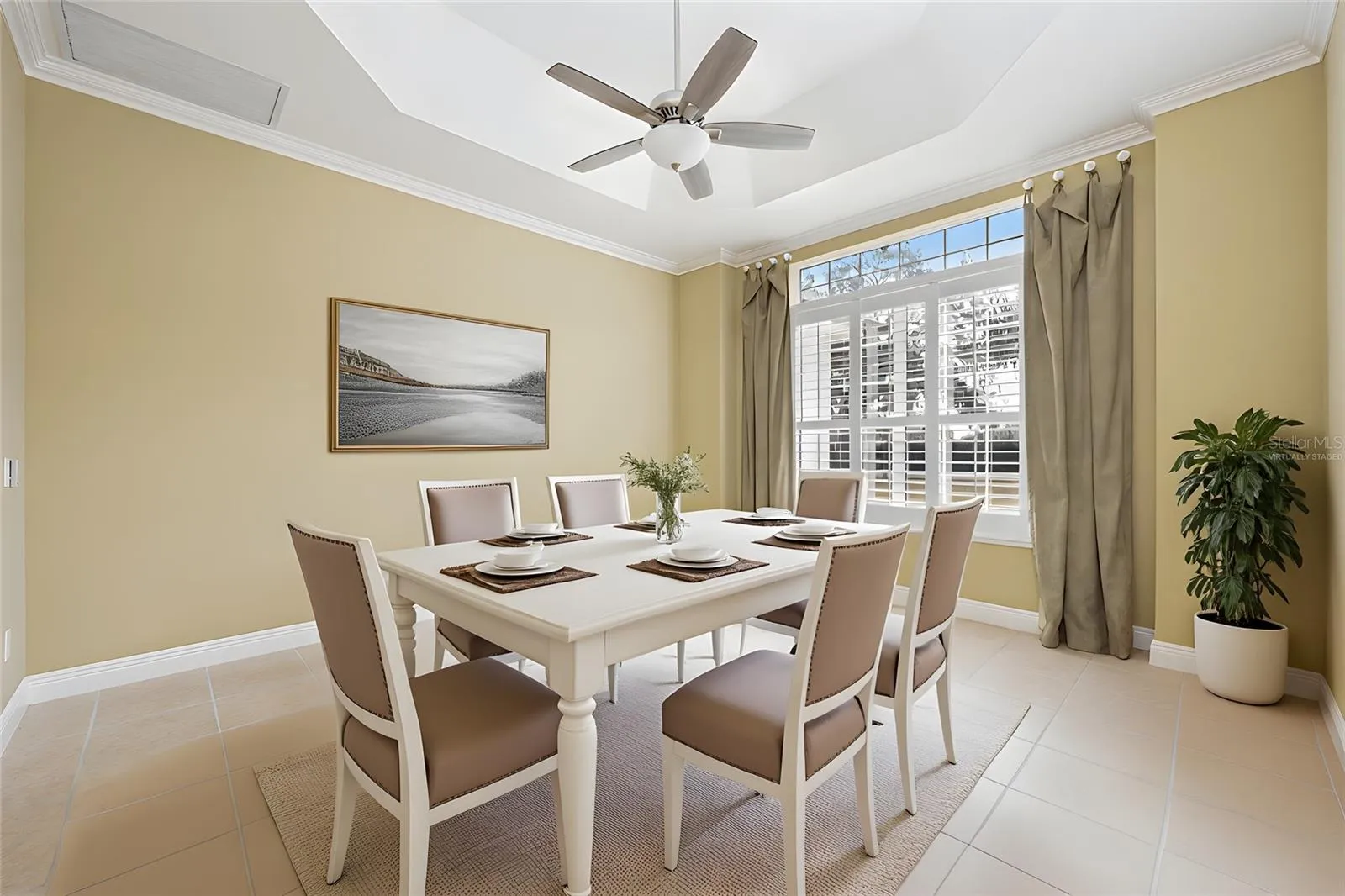 Versatile formal dining space. Virtually Staged.