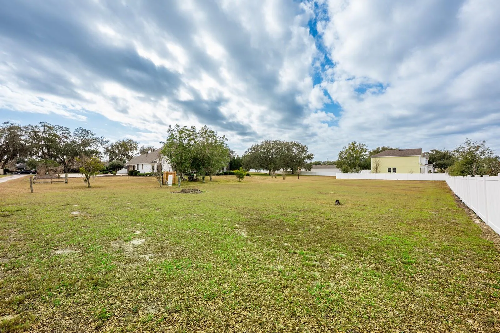 The second attached lot is fully buildable, offering endless possibilities – add a detached garage, workshop, guest home, or create a multi-generational setup.