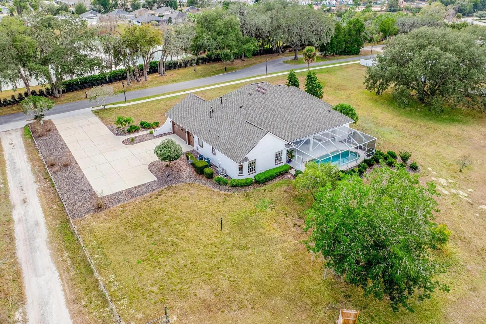 With no HOA restrictions, space for toys, hobbies, or future expansion, and proximity to The Villages, this property stands in a category all its own.